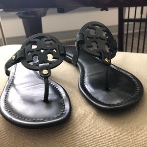 Tory Burch black sandal with gold accents